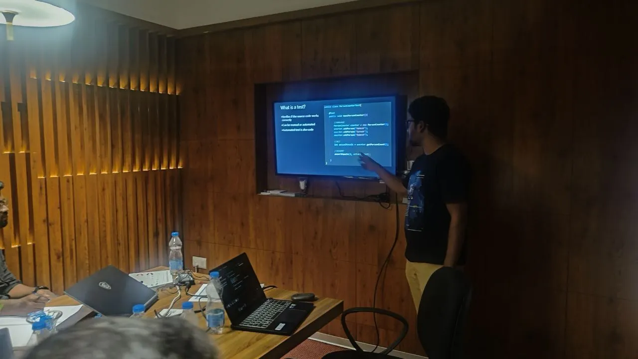 A speaker presenting during a workshop